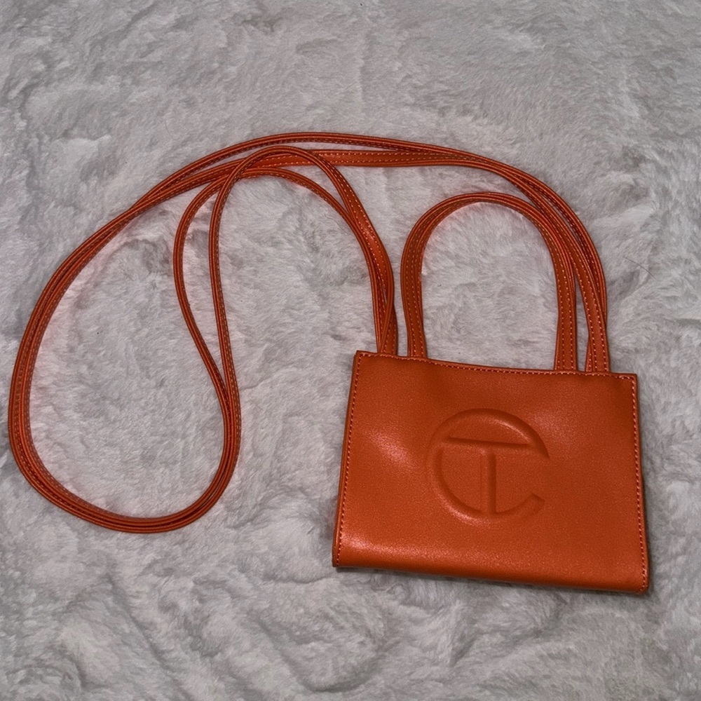 Small orange telfar bag